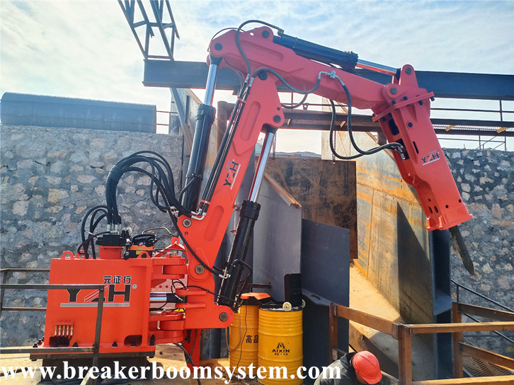 Pedestal boom rompe rocas