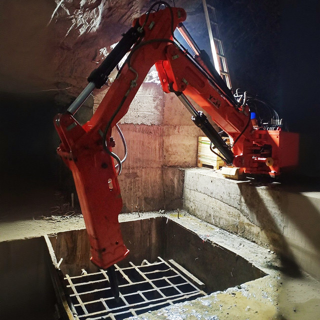 Sistema de boom de interruptores de roca hidráulicos