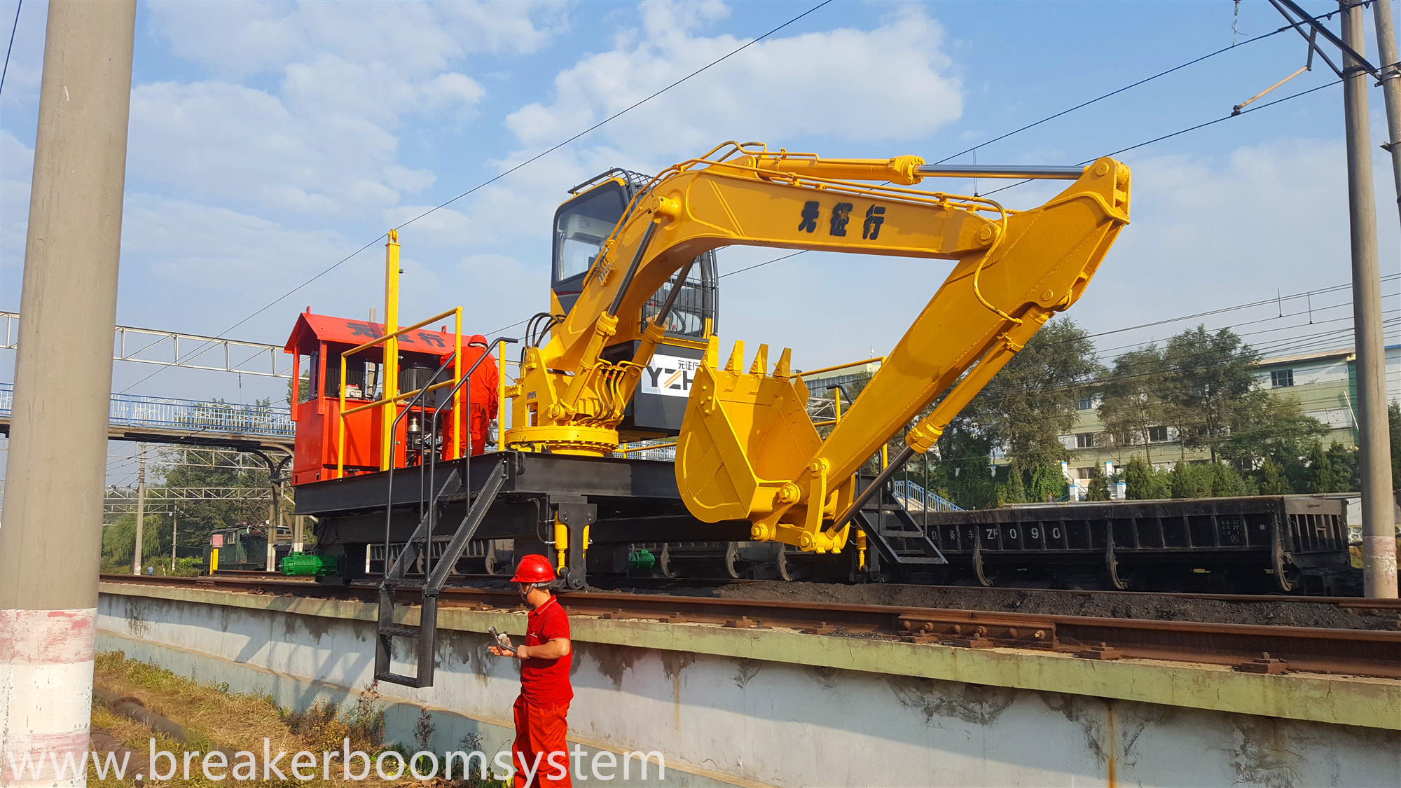 Sistema de pluma de pedestal de servicio pesado